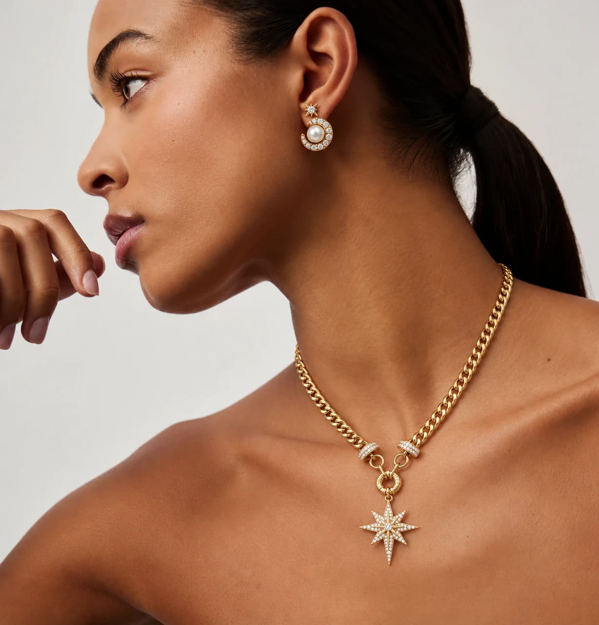 Model wearing the Celestial North Star Necklace and Pearl Orbit Earrings
